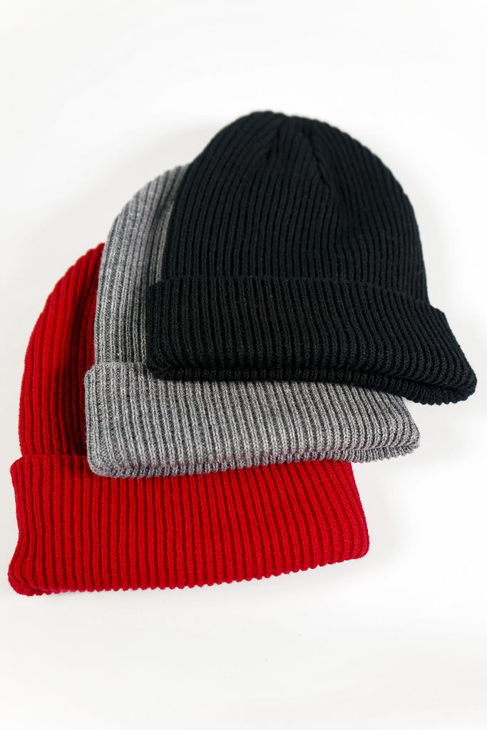 Keep your head warm with this ribbed knit beanie featuring a foldover brim.